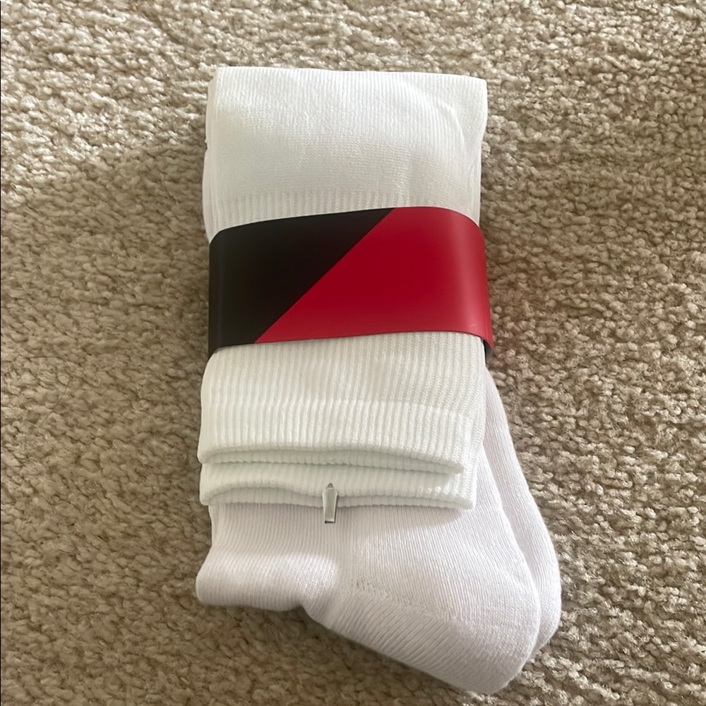 White Crew-Length Athletic Socks with Ribbed Design for lax and field hockey
